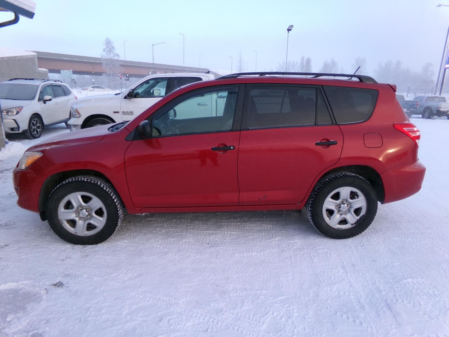 2012 Red Toyota RAV4 Base I4 4WD (2T3BF4DV1CW) with an 2.4L L4 DOHC 16V engine, 4-Speed Automatic transmission, located at 2630 Philips Field Rd., Fairbanks, AK, 99709, (907) 458-0593, 64.848068, -147.780609 - Photo#2